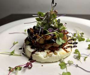 Grilled Manouri with dried fig bruschetta
