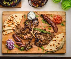 The Mediterranean Grille: Lollipop lamb chops, chicken skewers, gyro carvings and loukaniko (traditional village sausage).