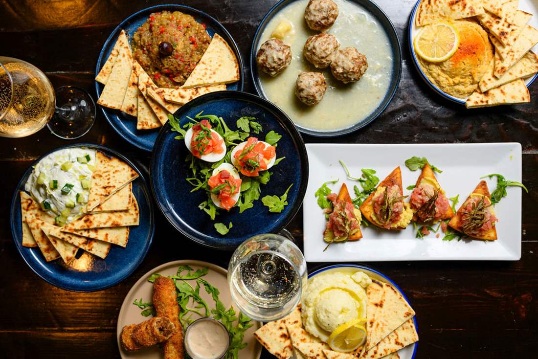 A table laid with Greca's meze.