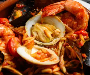 Thalassino: Shrimp, mussels, clams, orzo pasta and a splash of ouzo