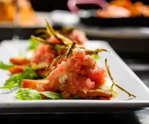 Tuna tartare on a crispy pita with Santorini fava and crispy kritamo.